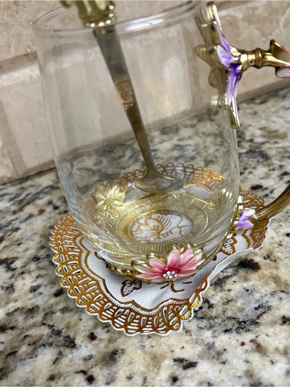 Glass Tea Cup with Gold Floral Handle and Pink Accents